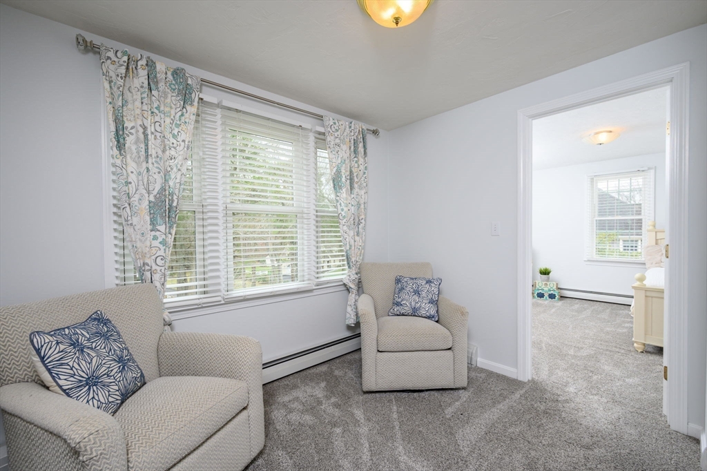72 Pilgrim Trail Marshfield, MA 02050 - Photo 23 of 42 a living room with furniture and a window
