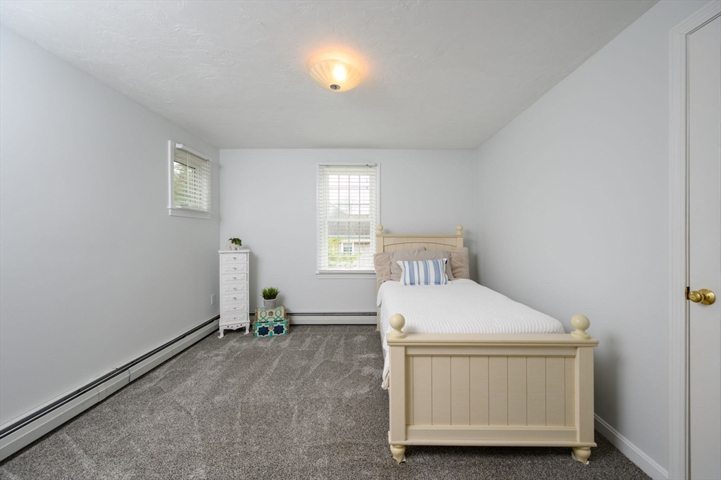 72 Pilgrim Trail Marshfield, MA 02050 - Photo 24 of 42 a room with a bed and a window