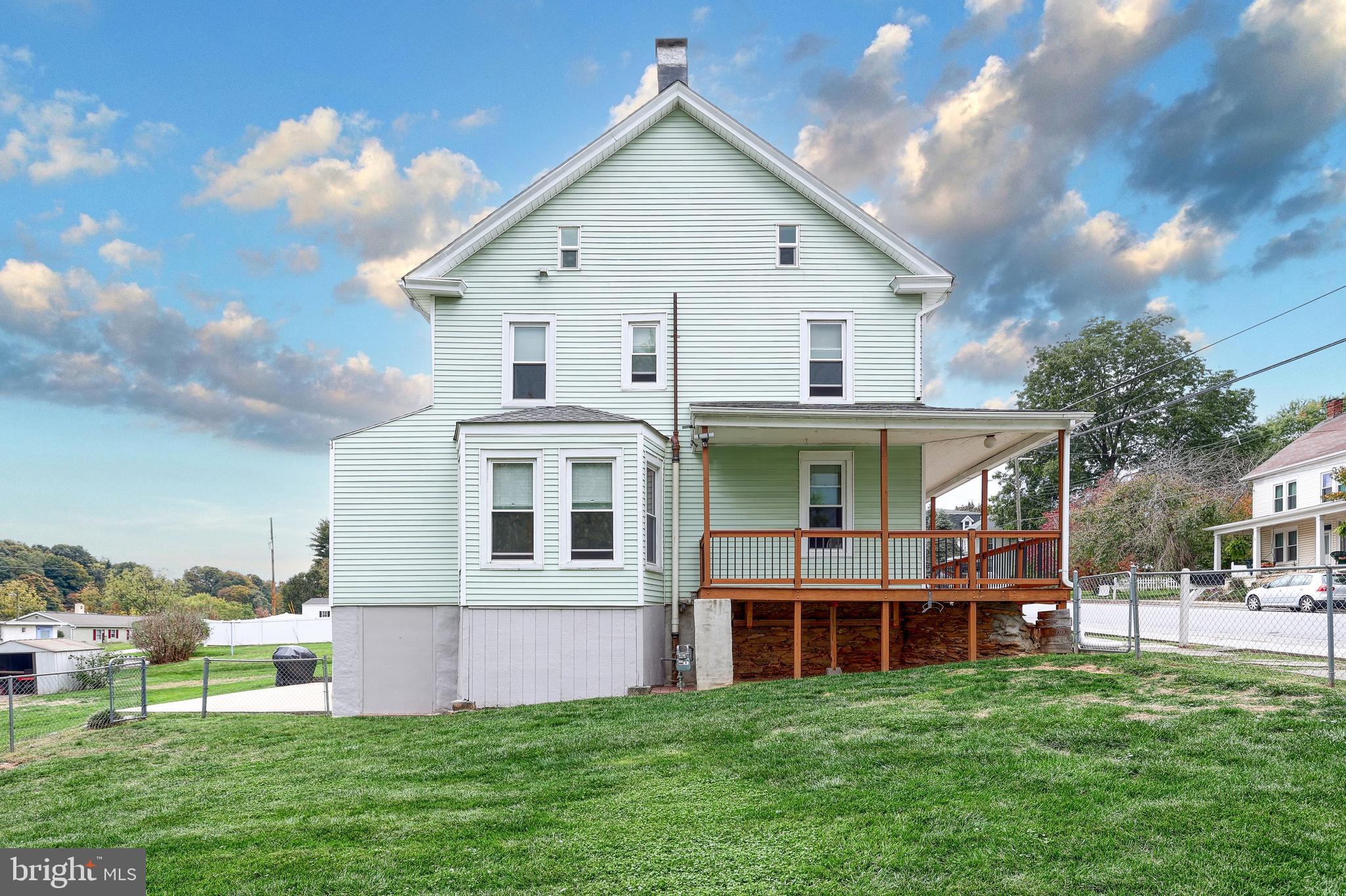 3 West High Street Windsor, PA 17366 - Photo 11 of 63 a view of a house with a yard and many windows