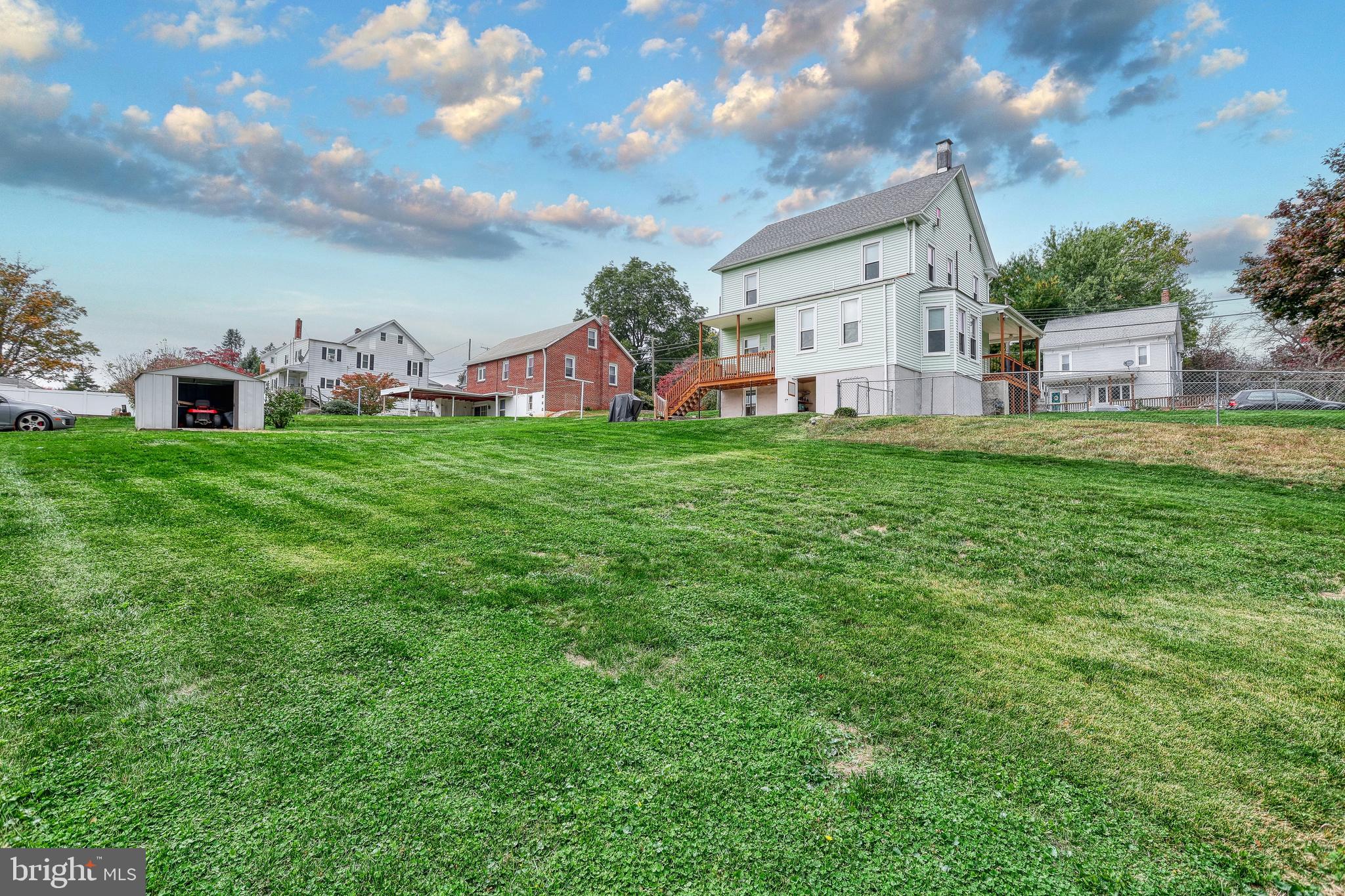 3 West High Street Windsor, PA 17366 - Photo 15 of 63 a view of a house with a backyard and a garden