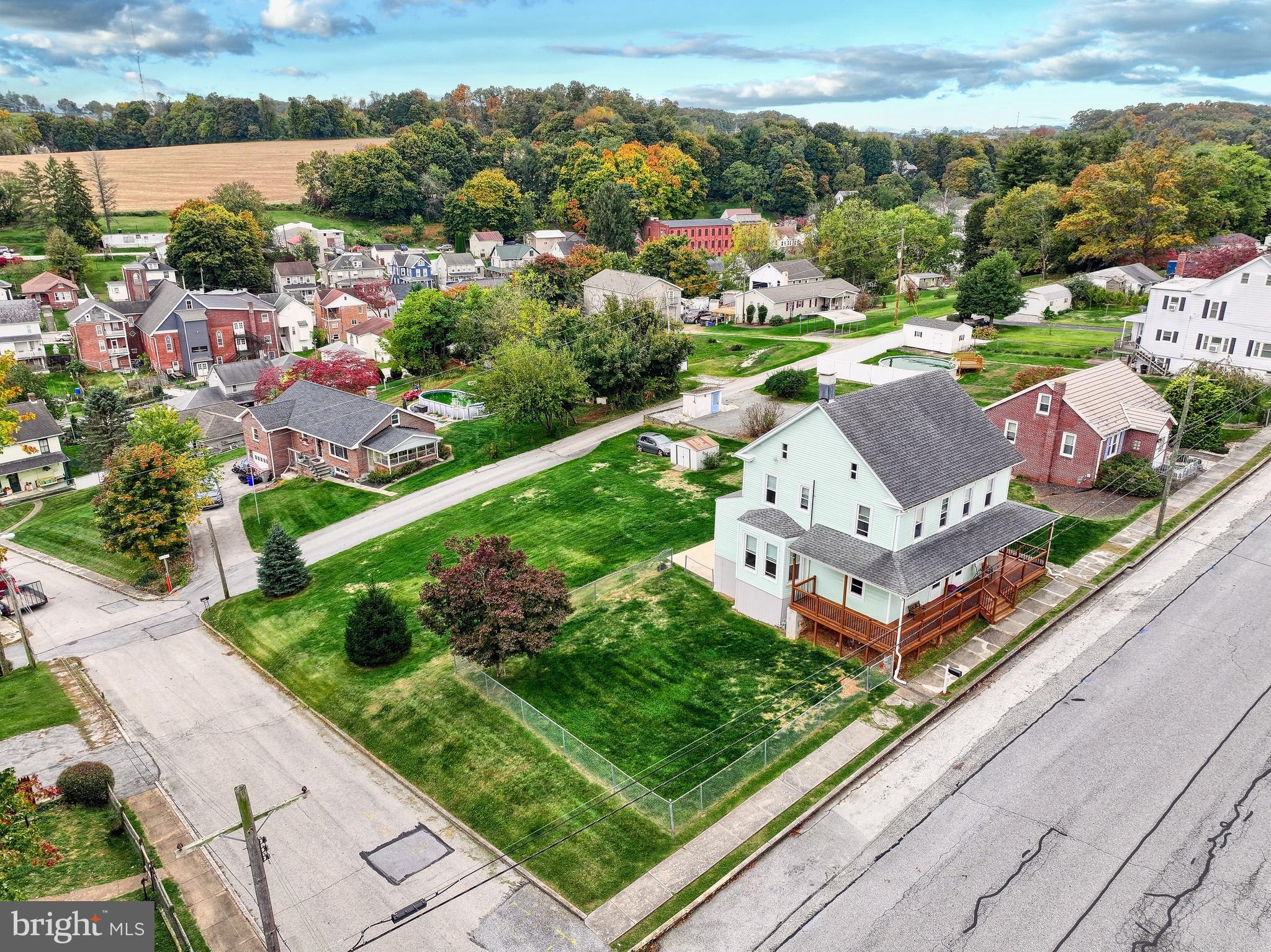 3 West High Street Windsor, PA 17366 - Photo 26 of 63 an aerial view of a house with a garden and lake view