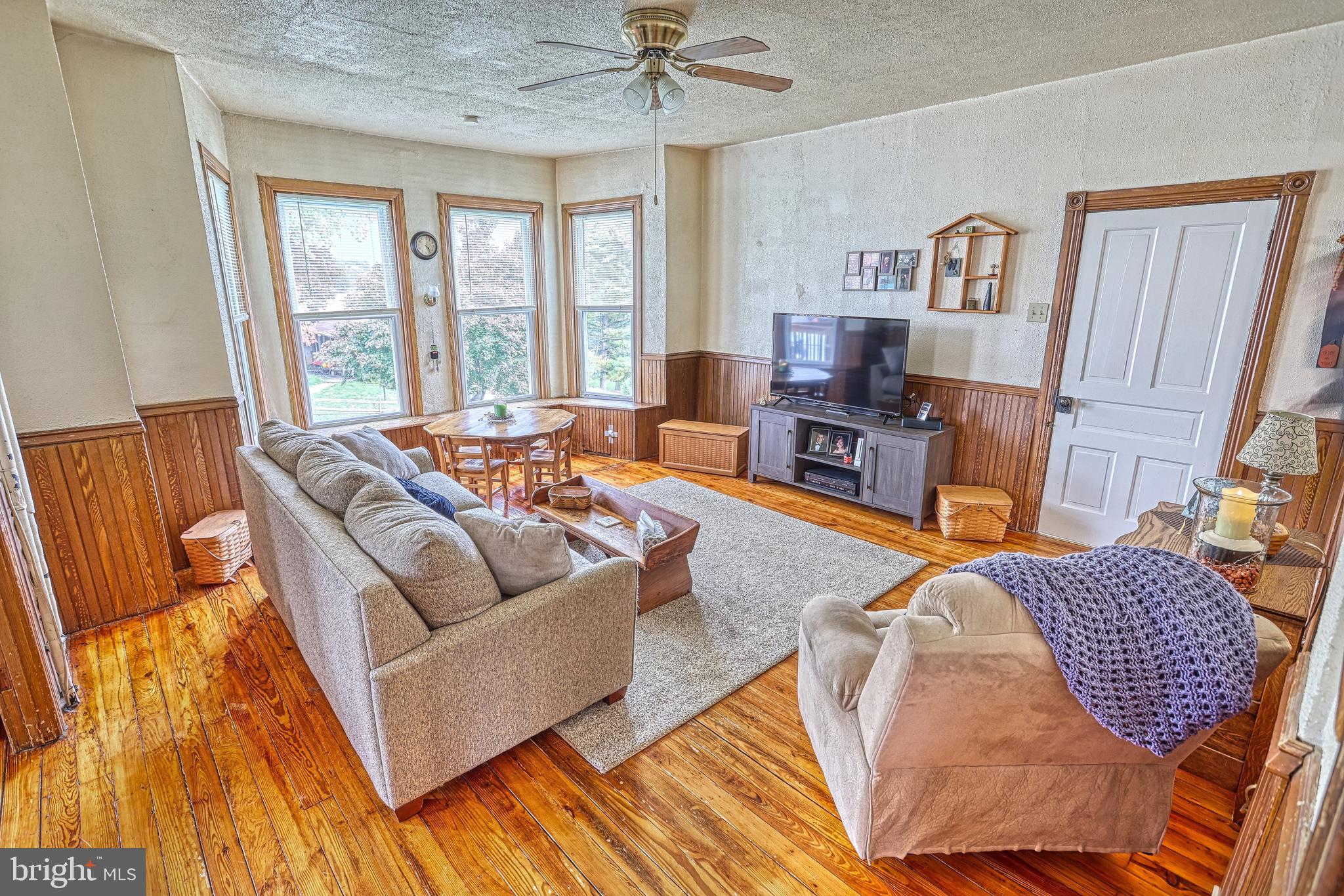 3 West High Street Windsor, PA 17366 - Photo 38 of 63 a living room with furniture and a fireplace