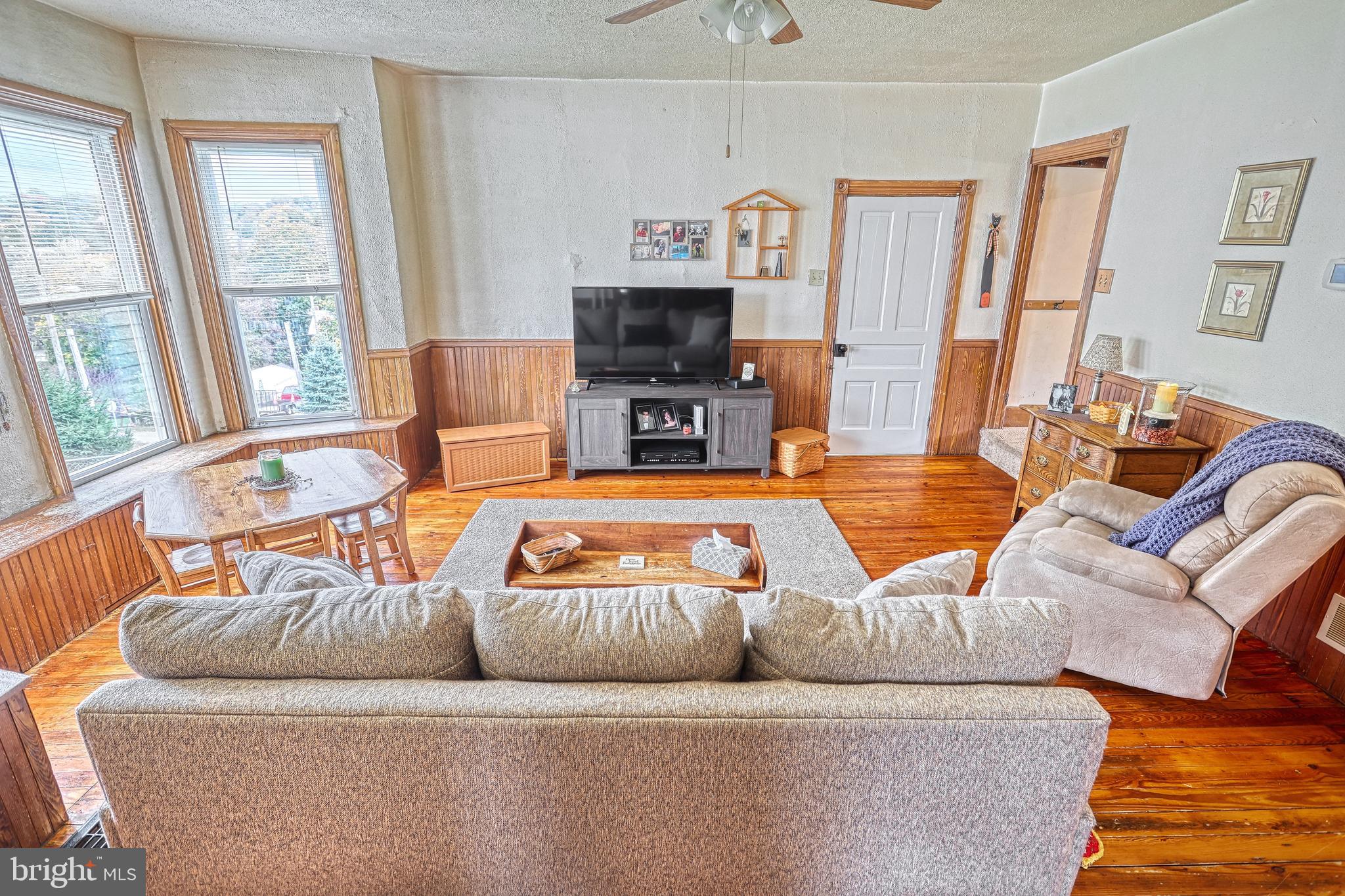 3 West High Street Windsor, PA 17366 - Photo 47 of 63 a living room with furniture and a flat screen tv