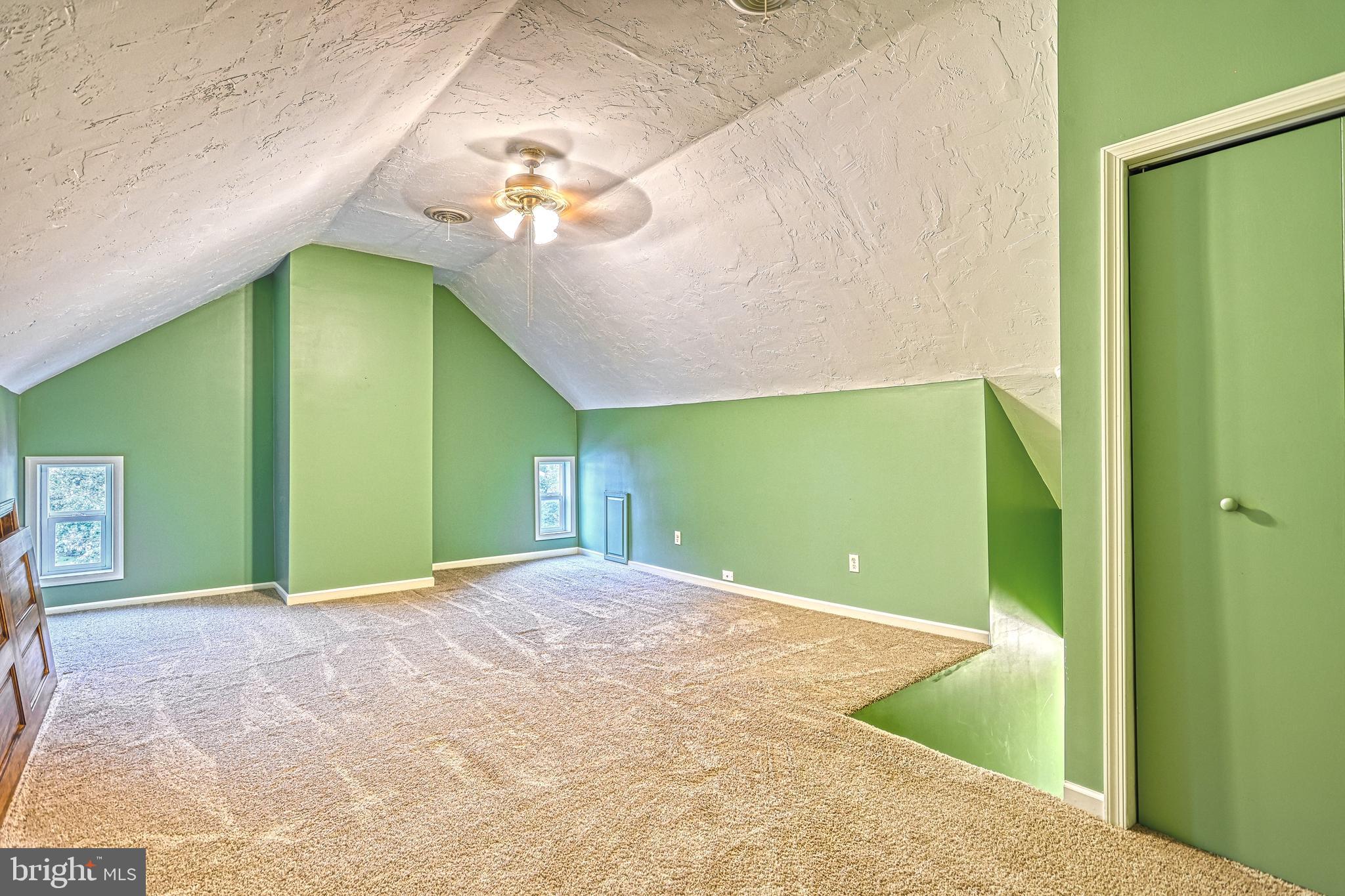 3 West High Street Windsor, PA 17366 - Photo 57 of 63 a view of a big room with a fireplace and a chandelier fan