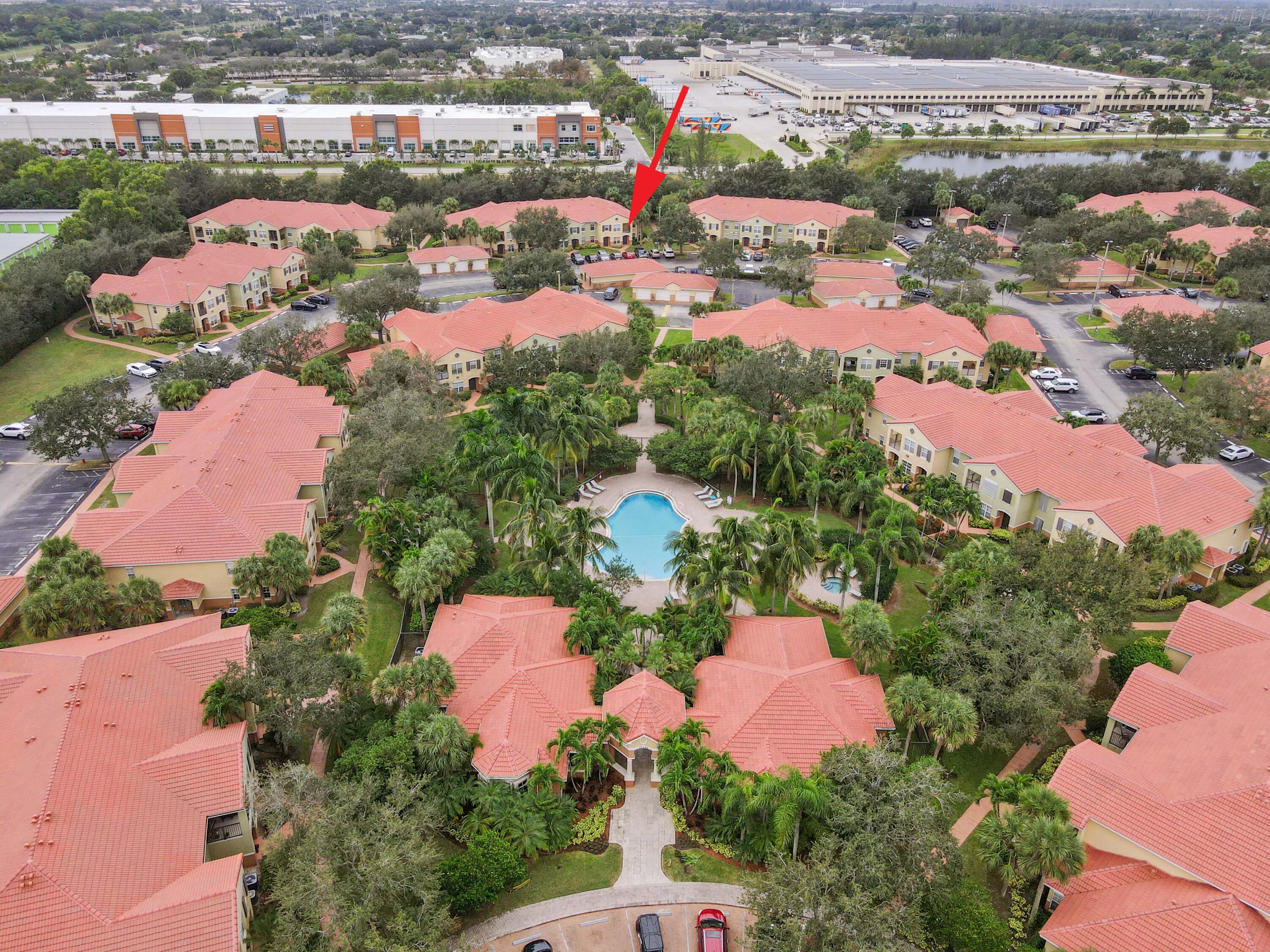10306 Fox Trail Road South, Unit 906 West Palm Beach, FL 33411 - Photo 26 of 26 an aerial view of residential houses with outdoor space