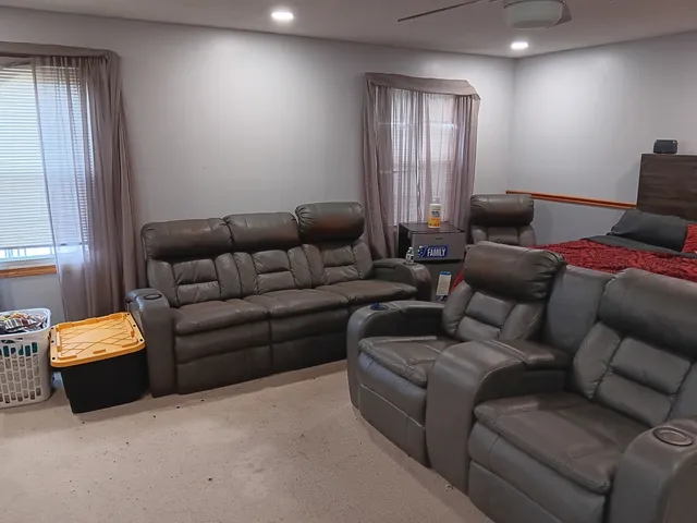 a living room with furniture and window