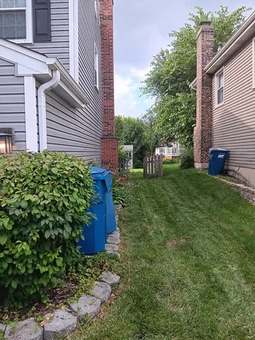 a view of a back yard of the house