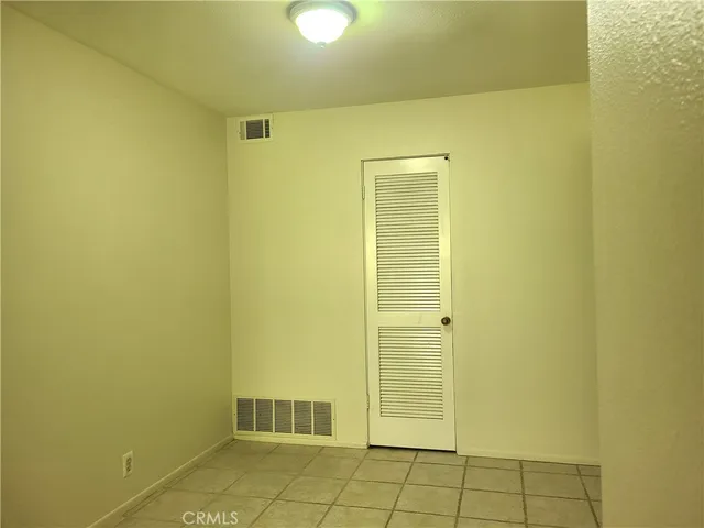 a kitchen with stainless steel appliances a stove a microwave and sink