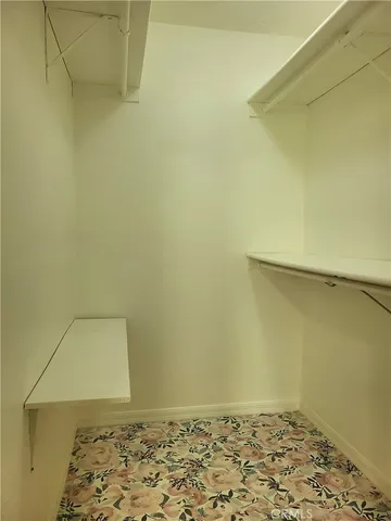 a view of a door and wooden floor