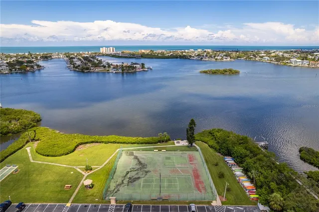 a view of a lake in middle of the town