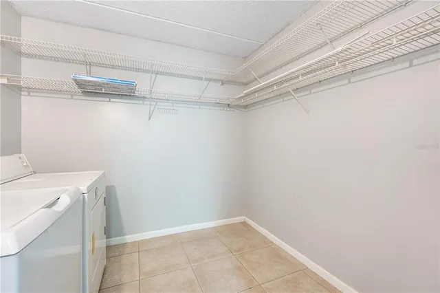a view of a storage & utility room with a sink