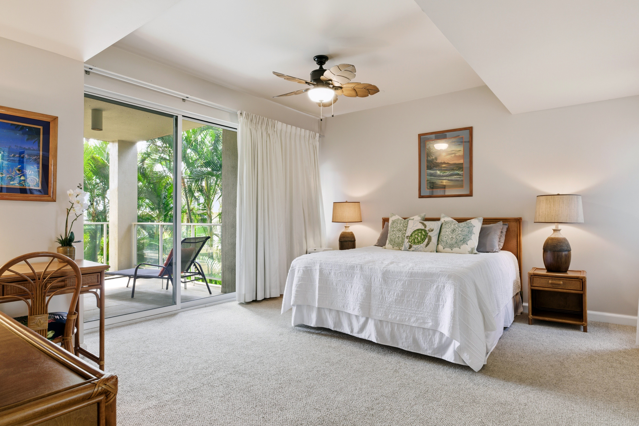 68-1010 Keana Place, Unit E206 Waikoloa, HI 96738 - Photo 18 of 30 a spacious bedroom with a bed and a large window