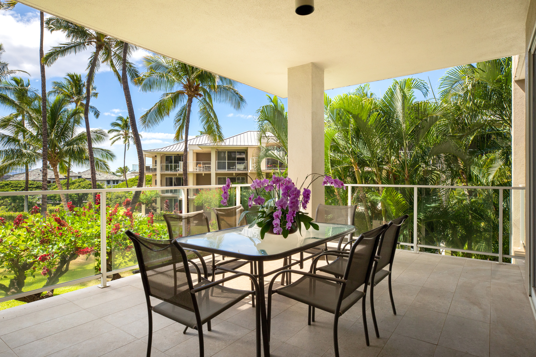 68-1010 Keana Place, Unit E206 Waikoloa, HI 96738 - Photo 2 of 30 a view of a chairs and table in the patio