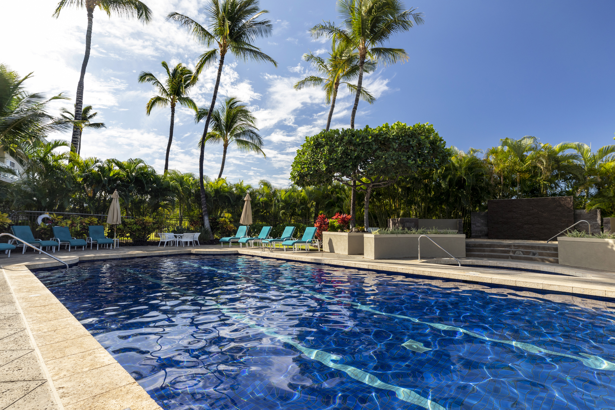 68-1010 Keana Place, Unit E206 Waikoloa, HI 96738 - Photo 25 of 30 a house view with a garden space