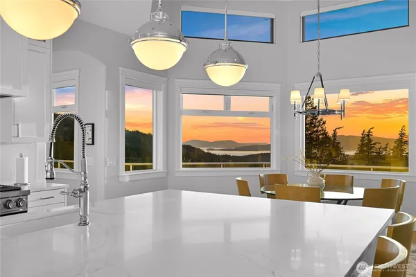 a view of a living room and a floor to ceiling window