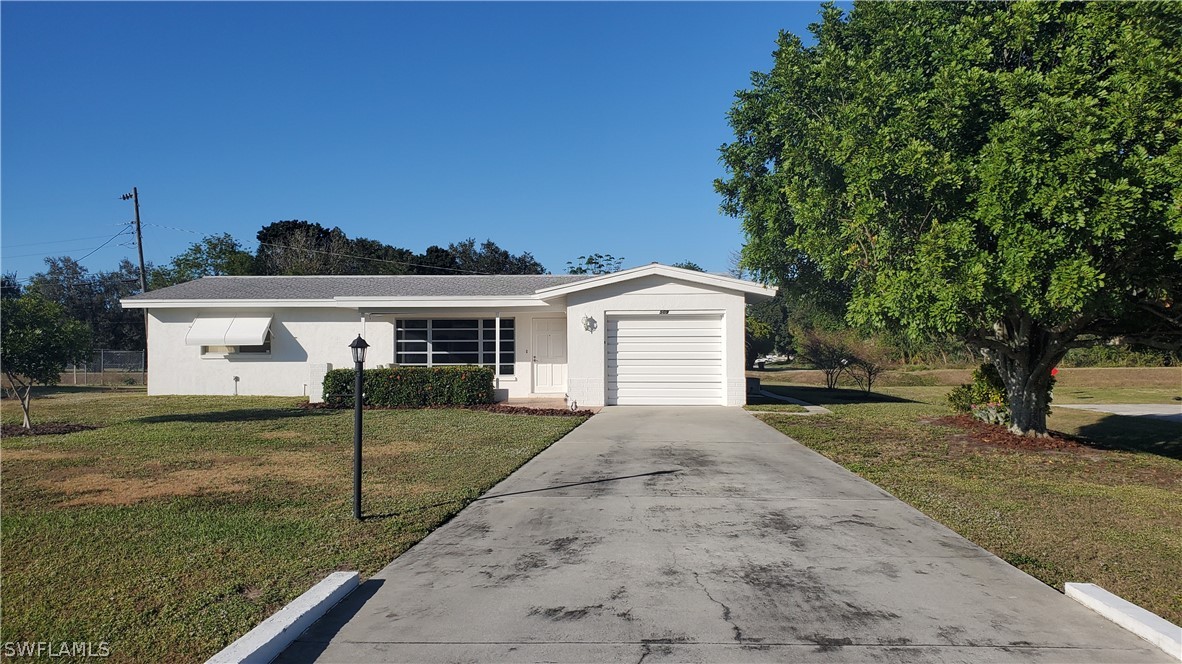 509 East Jasmine Road Lehigh Acres, FL 33936 - Photo 2 of 26 Gallery Image 2