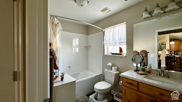929 West 1920 South, Unit A Syracuse, UT 84075 - Photo 13 of 26 Full bathroom with vanity, shower / tub combo, and toilet