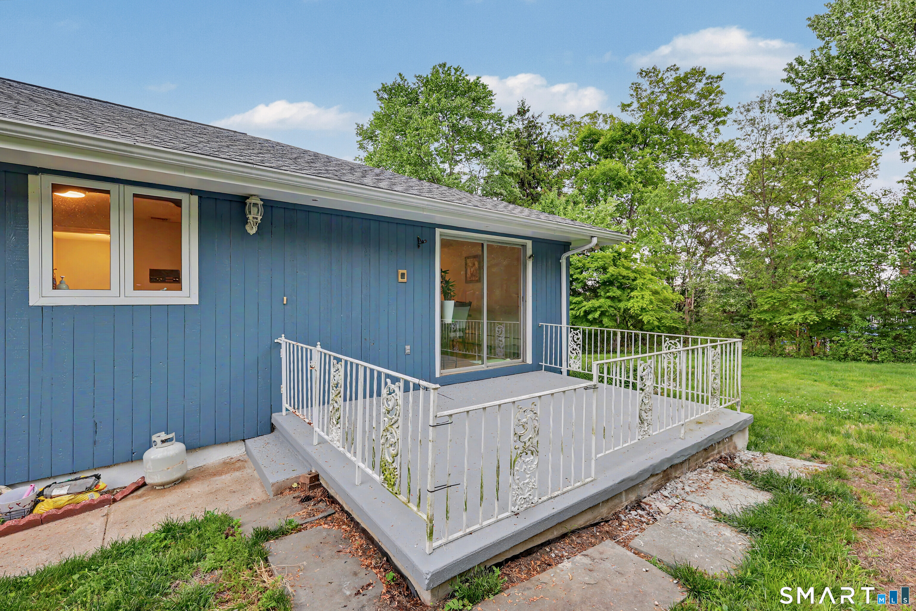 44 Haverhill Road Trumbull, CT 06611 - Photo 30 of 32 a view of a wooden deck and a backyard