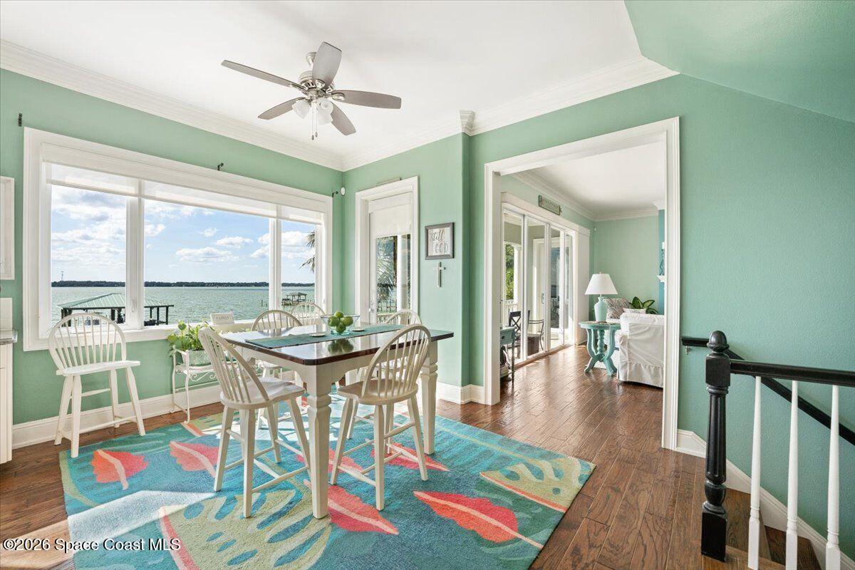 2555 South Tropical Trail Merritt Island, FL 32952 - Photo 23 of 91 a view of a livingroom with furniture window and wooden floor