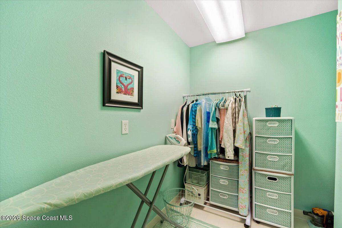 2555 South Tropical Trail Merritt Island, FL 32952 - Photo 38 of 91 a view of a bedroom with closet