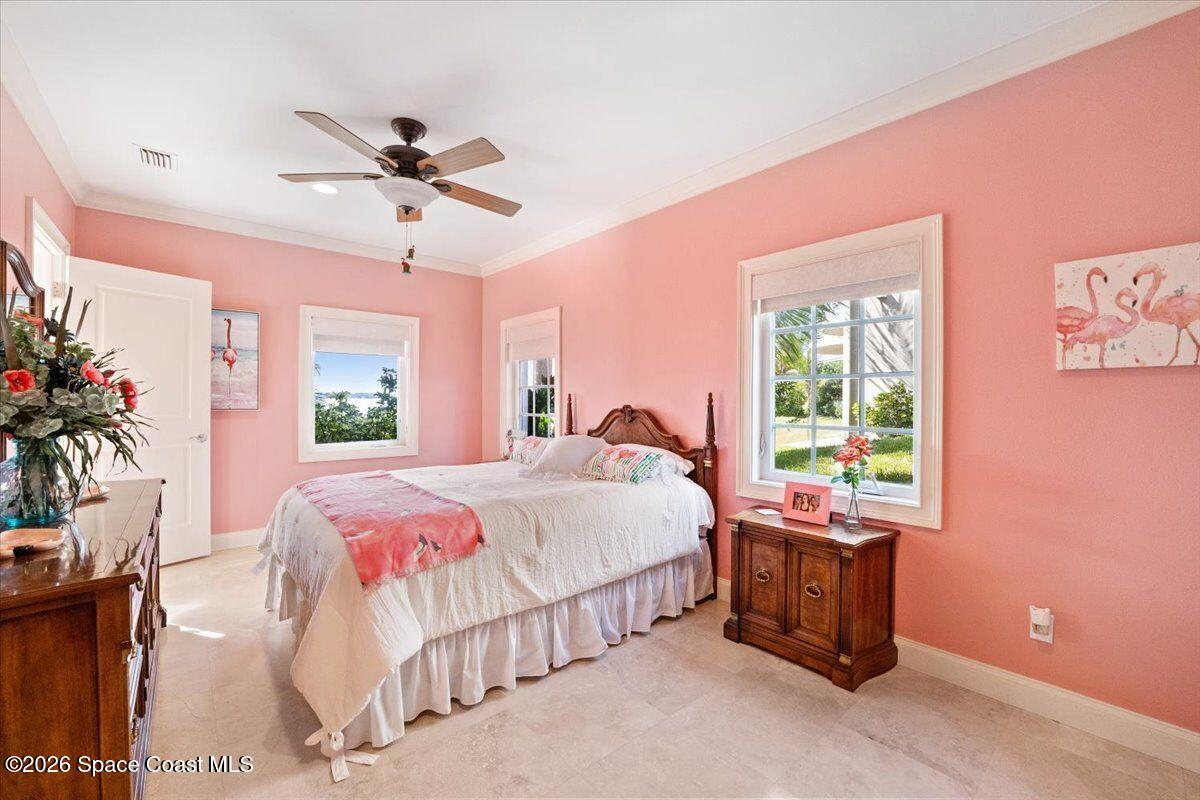 2555 South Tropical Trail Merritt Island, FL 32952 - Photo 50 of 91 a bed room with a bed and a window