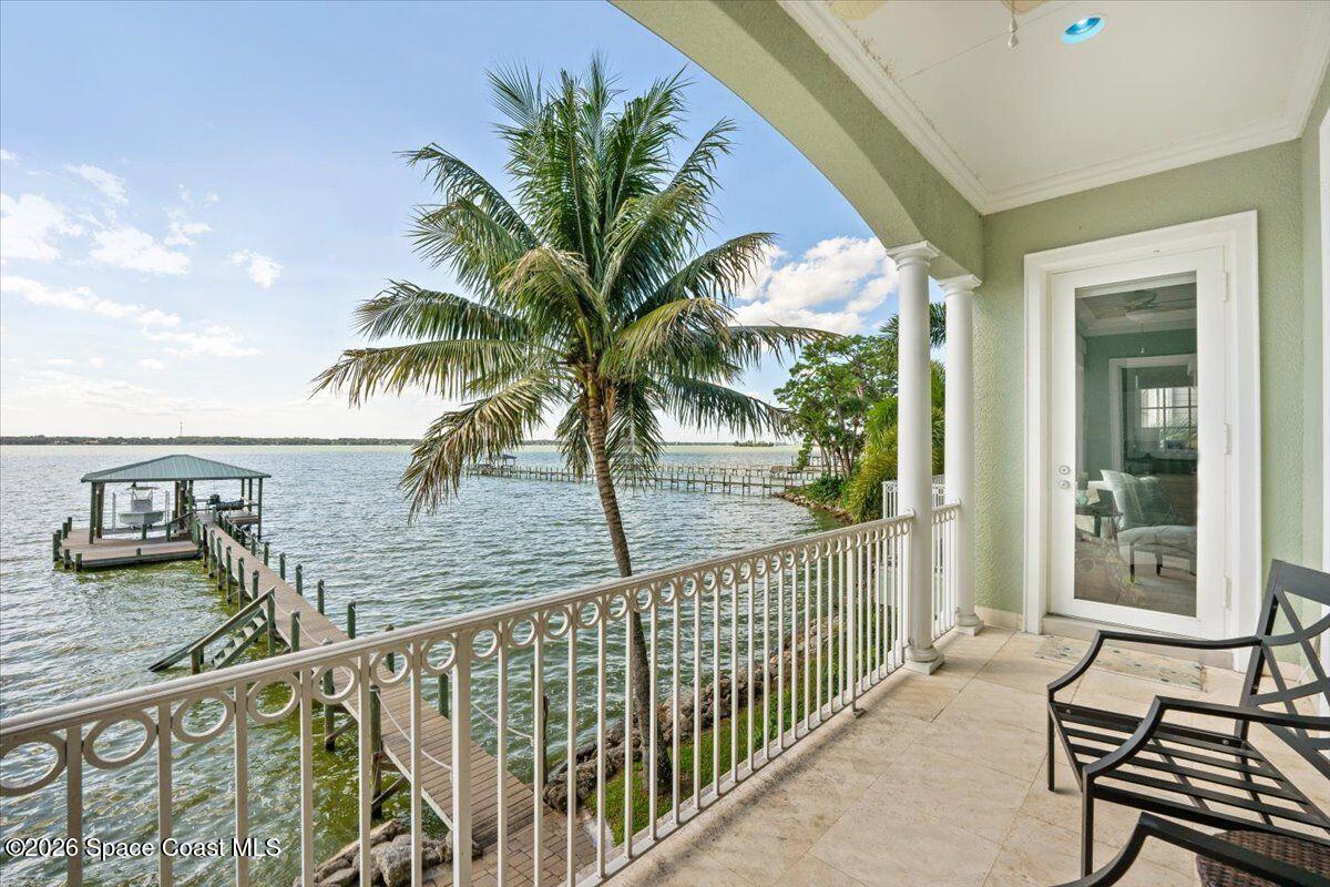 2555 South Tropical Trail Merritt Island, FL 32952 - Photo 58 of 91 a view of a balcony with potted plants