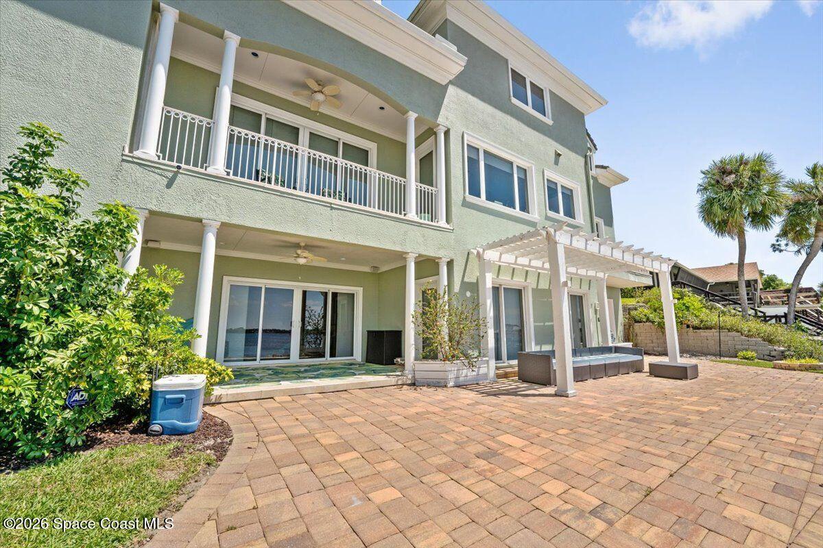 2555 South Tropical Trail Merritt Island, FL 32952 - Photo 60 of 91 a view of a building with a yard