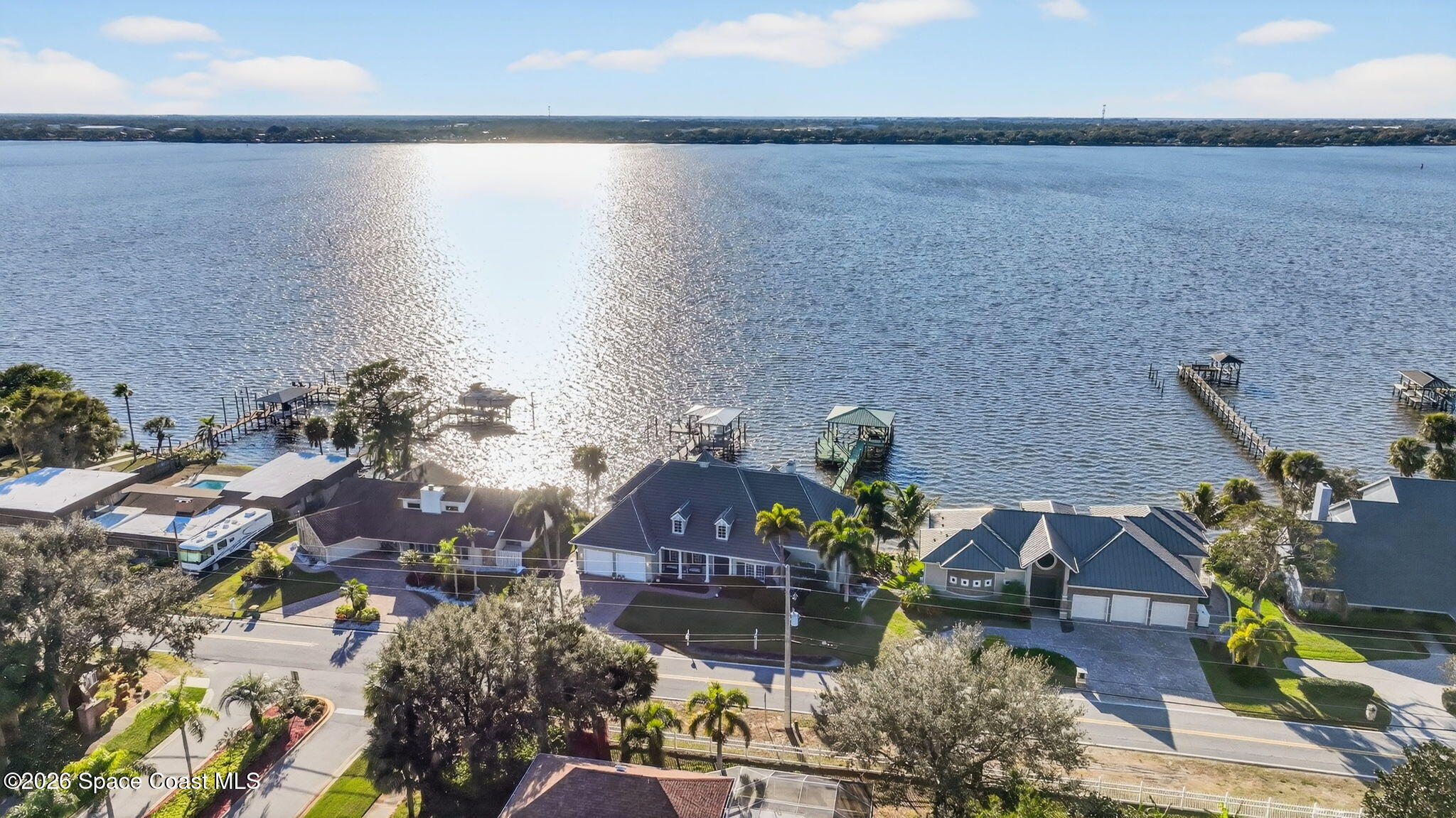 2555 South Tropical Trail Merritt Island, FL 32952 - Photo 80 of 91 an aerial view of houses with yard