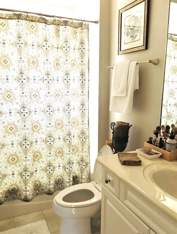 2663 Upper Park Road Orlando, FL 32814 - Photo 13 of 17 a bathroom with a toilet and a sink