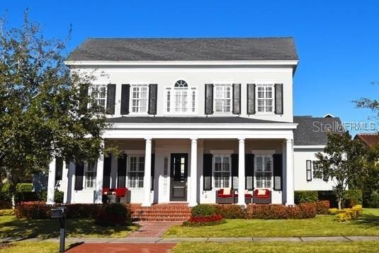2663 Upper Park Road Orlando, FL 32814 - Photo 17 of 17 a front view of a house with a yard