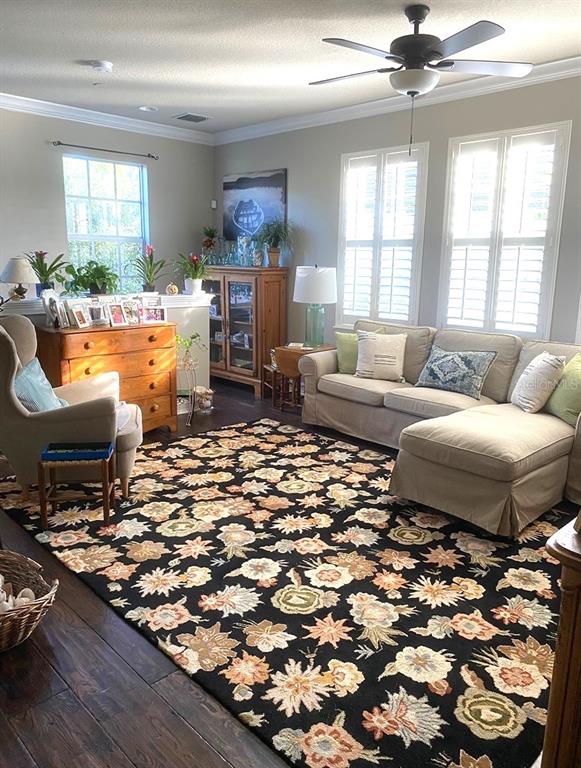 2663 Upper Park Road Orlando, FL 32814 - Photo 4 of 17 a living room with furniture and a large window