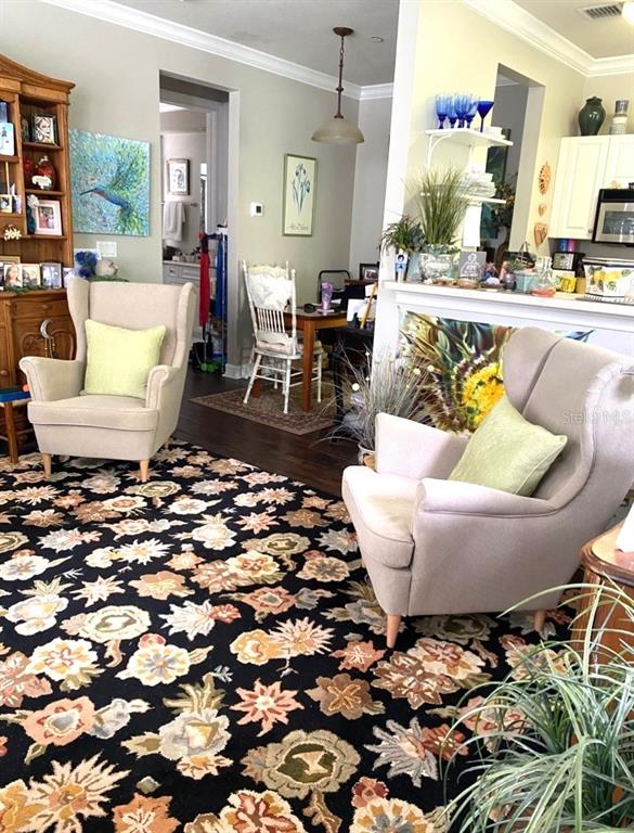 2663 Upper Park Road Orlando, FL 32814 - Photo 5 of 17 a living room with furniture and a potted plant