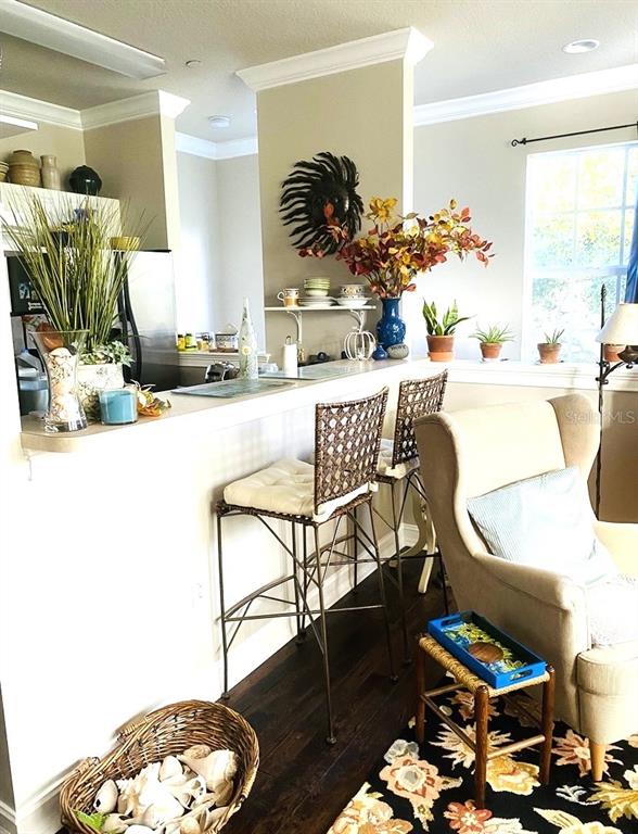 2663 Upper Park Road Orlando, FL 32814 - Photo 7 of 17 a dining room with furniture and wooden floor