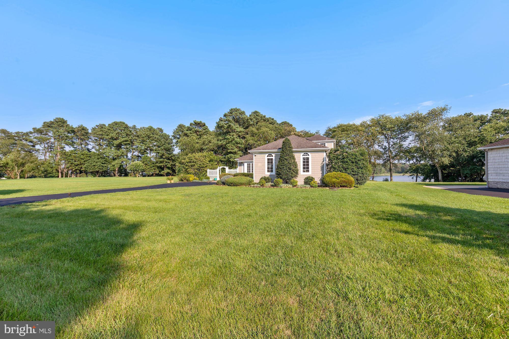 123 Riverview Drive Dagsboro, DE 19939 - Photo 5 of 55 Front Elevation with Water Beyond