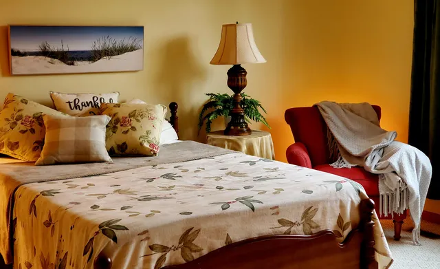 a bathroom with a tub and a shower