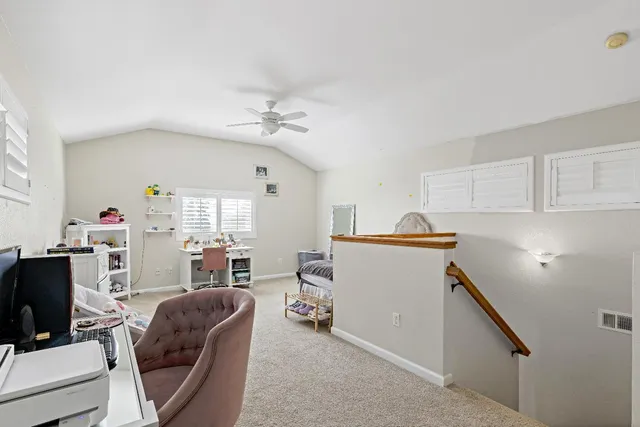 a view of kitchen and workspace