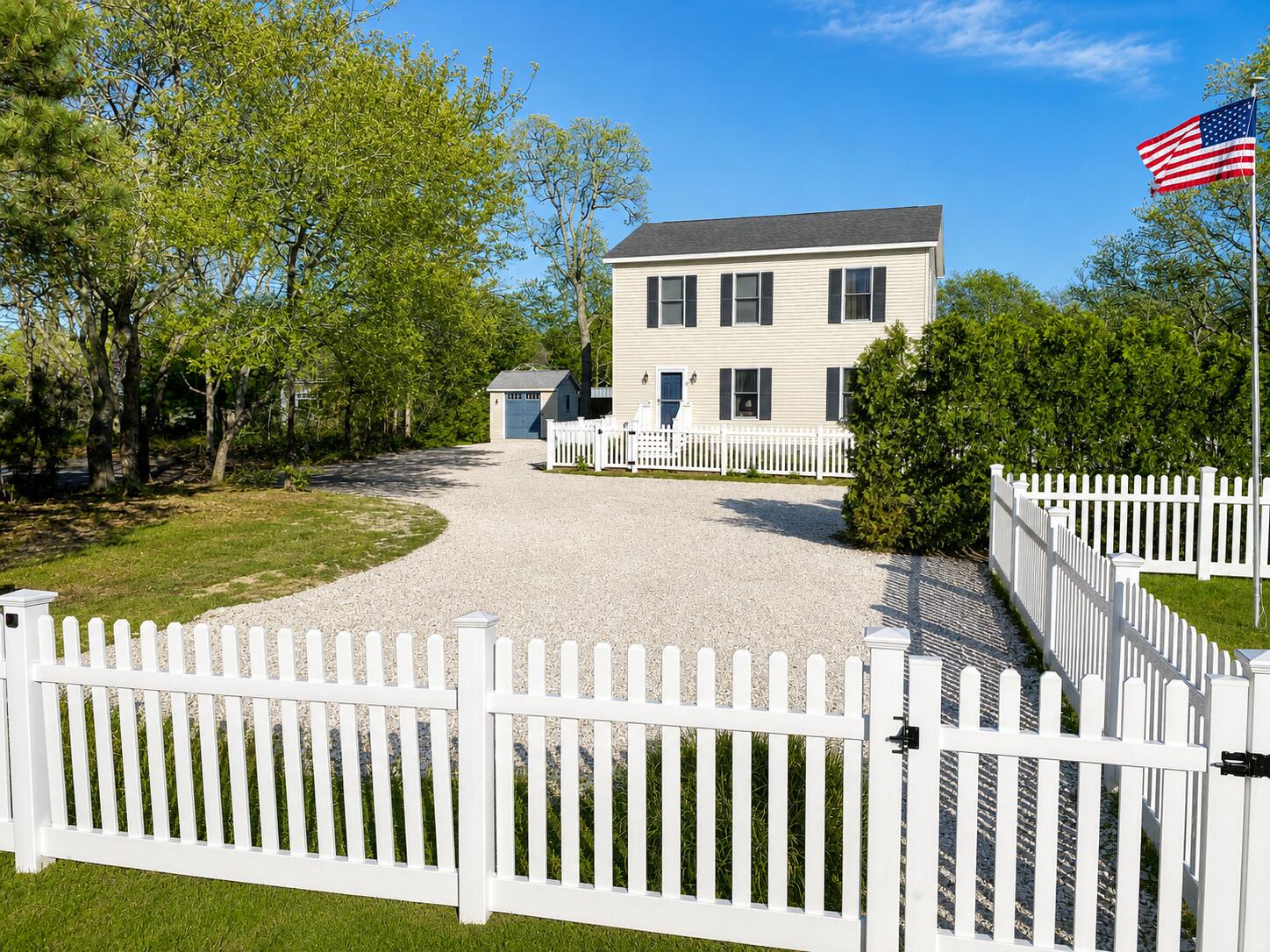 34 10th Street South Edgartown, MA 02539 - Photo 19 of 20 a view of a house with a wooden deck