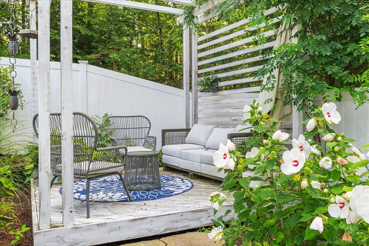 4 Laconia Drive Clinton, CT 06413 - Photo 15 of 40 a view of a vase with sitting on the roof