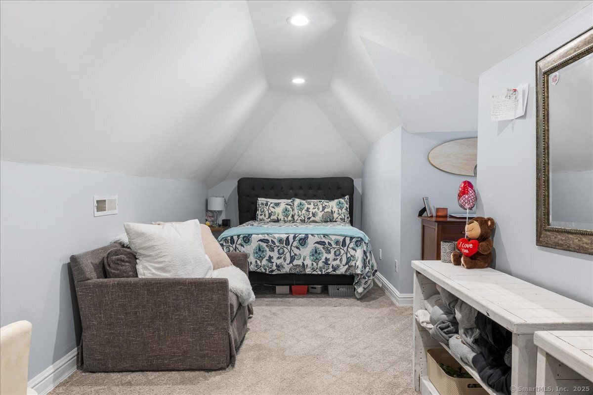 4 Laconia Drive Clinton, CT 06413 - Photo 24 of 40 a bedroom with a bed and a window