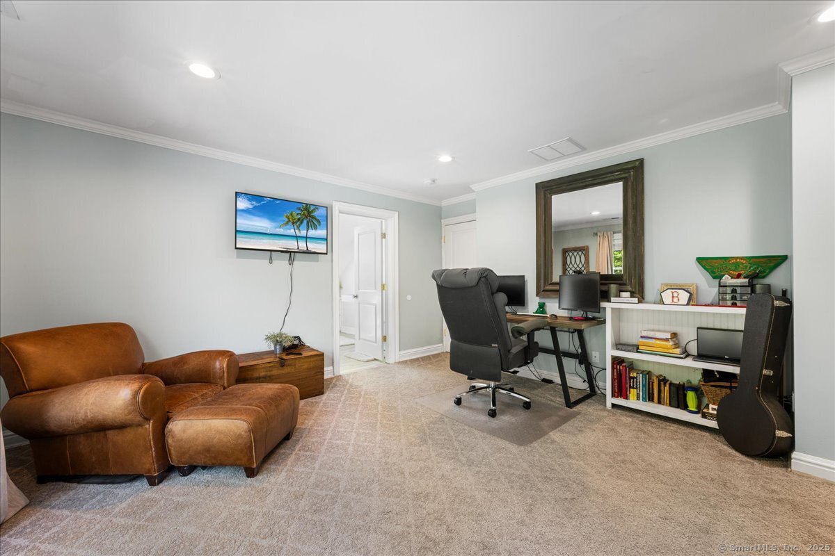 4 Laconia Drive Clinton, CT 06413 - Photo 28 of 40 a view of a livingroom with workspace and a couch