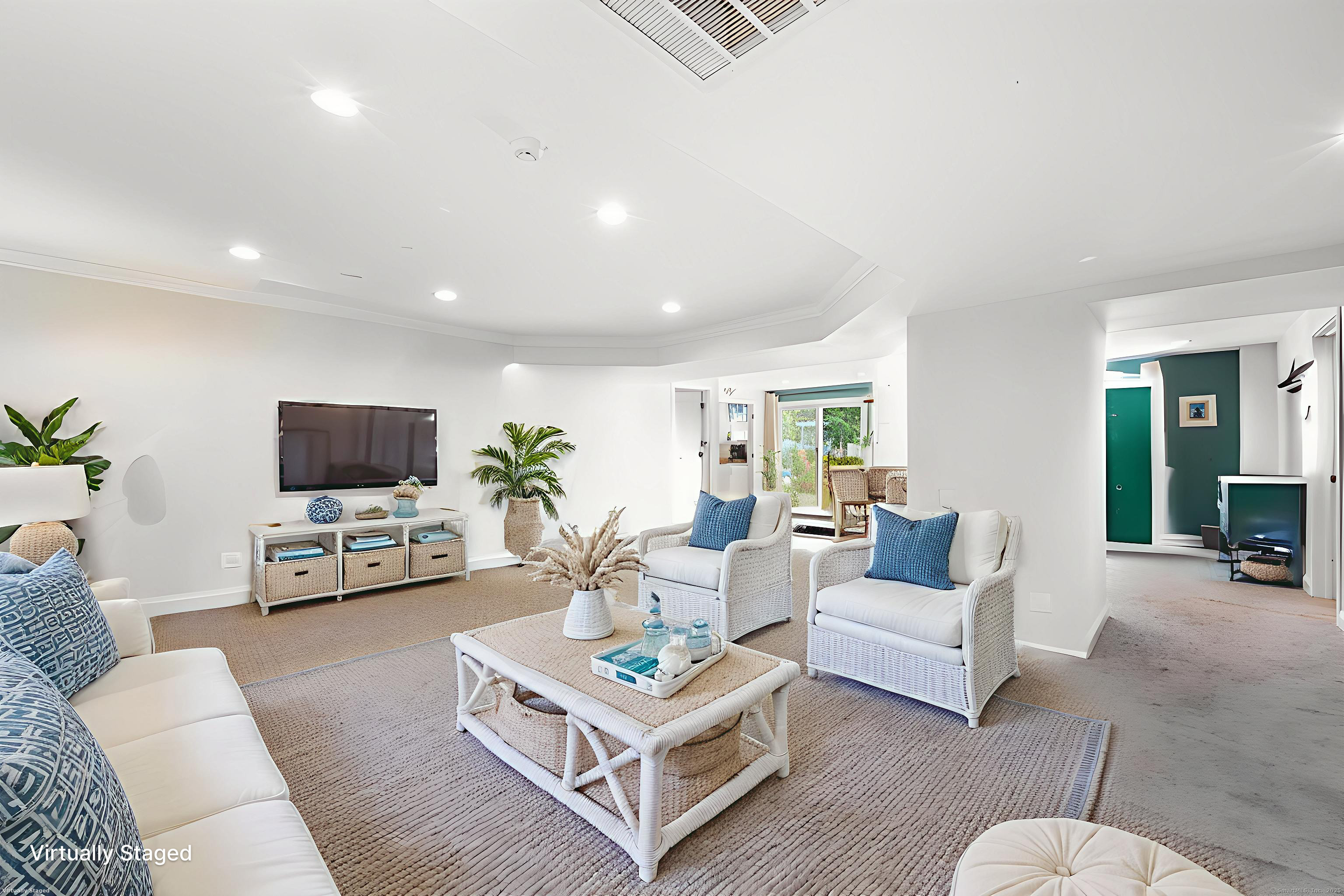 4 Laconia Drive Clinton, CT 06413 - Photo 31 of 40 a living room with furniture a flat screen tv and a table