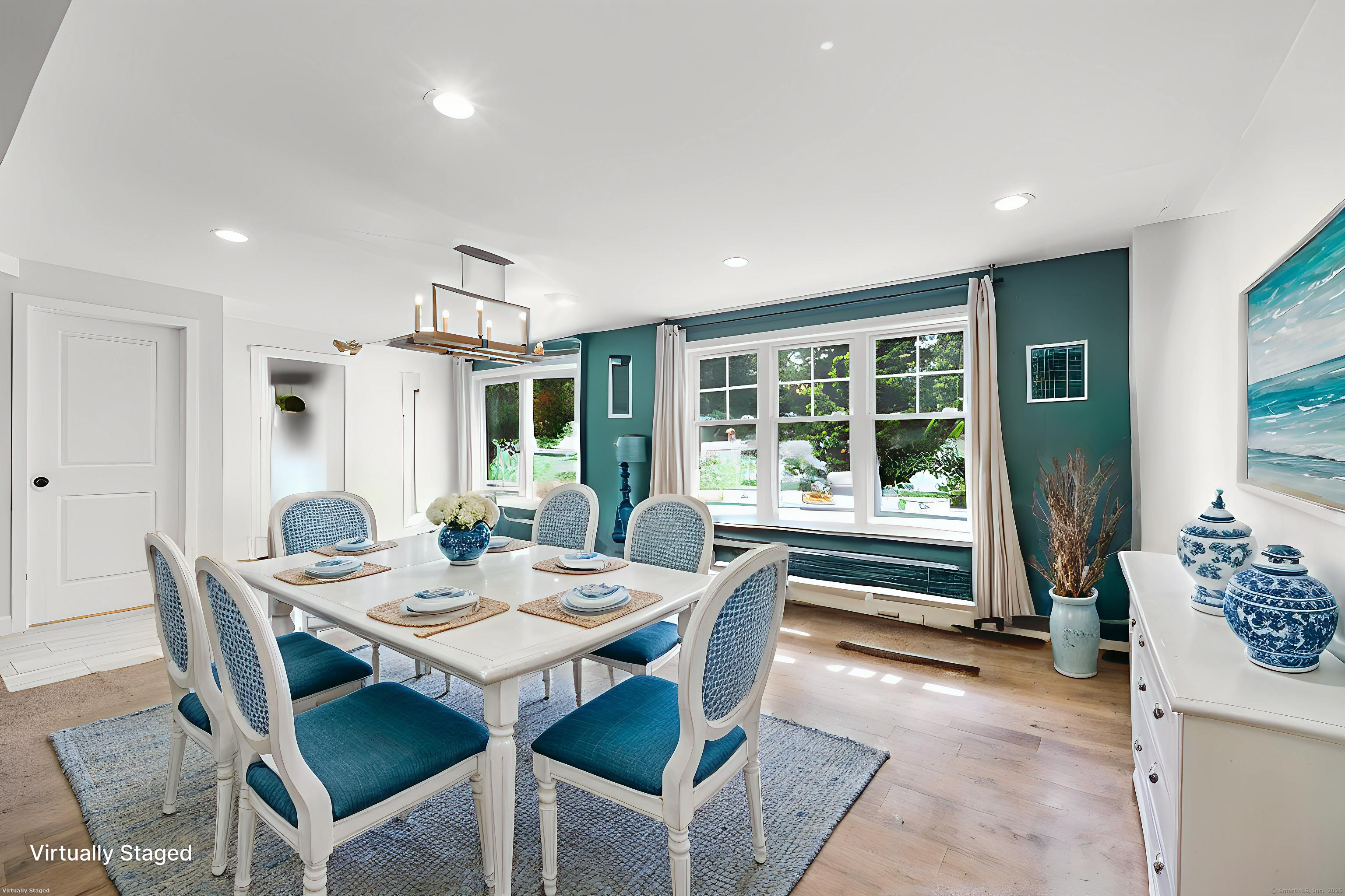 4 Laconia Drive Clinton, CT 06413 - Photo 32 of 40 a dining room with furniture window and wooden floor