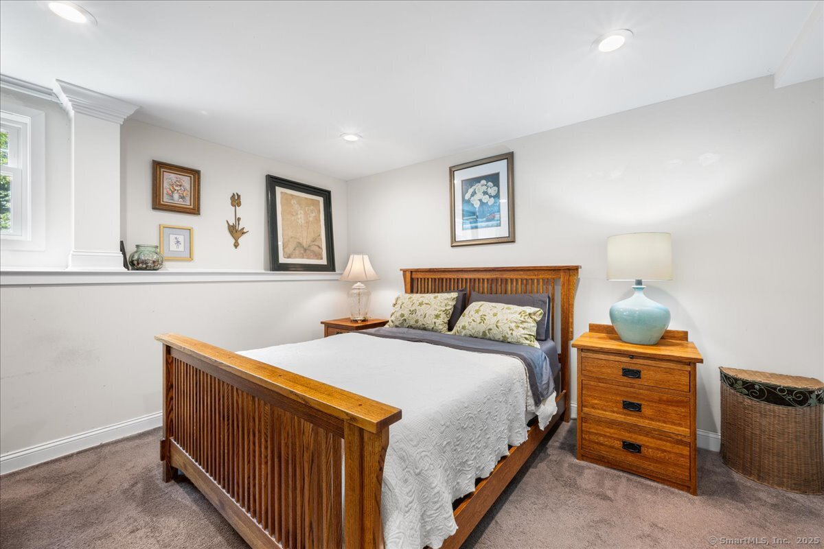 4 Laconia Drive Clinton, CT 06413 - Photo 34 of 40 a bedroom with a bed and a window