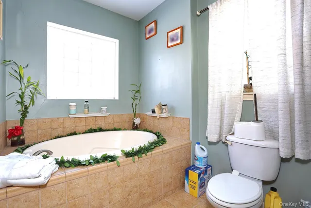 a view of kitchen and sink with dishwasher and furniture