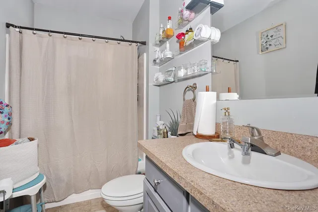 a bathroom with a shower and a tub