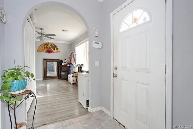 a view of entryway with livingroom and furniture