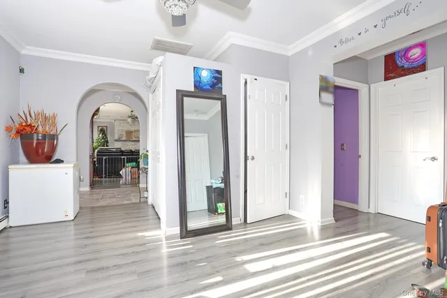 a view of a hallway view with staircase