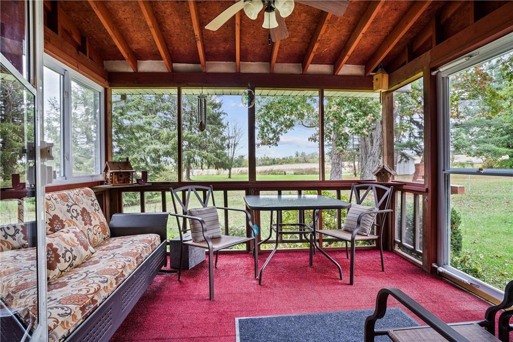 679 Mt Jackson Road New Castle, PA 16102 - Photo 12 of 14 a living room with furniture and a large window