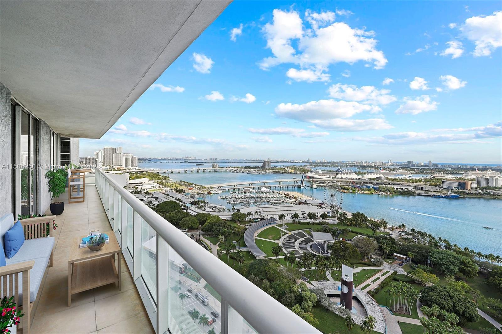 50 Biscayne Boulevard, Unit 3102 Miami, FL 33132 - Photo 2 of 43 a view of a balcony with an ocean view