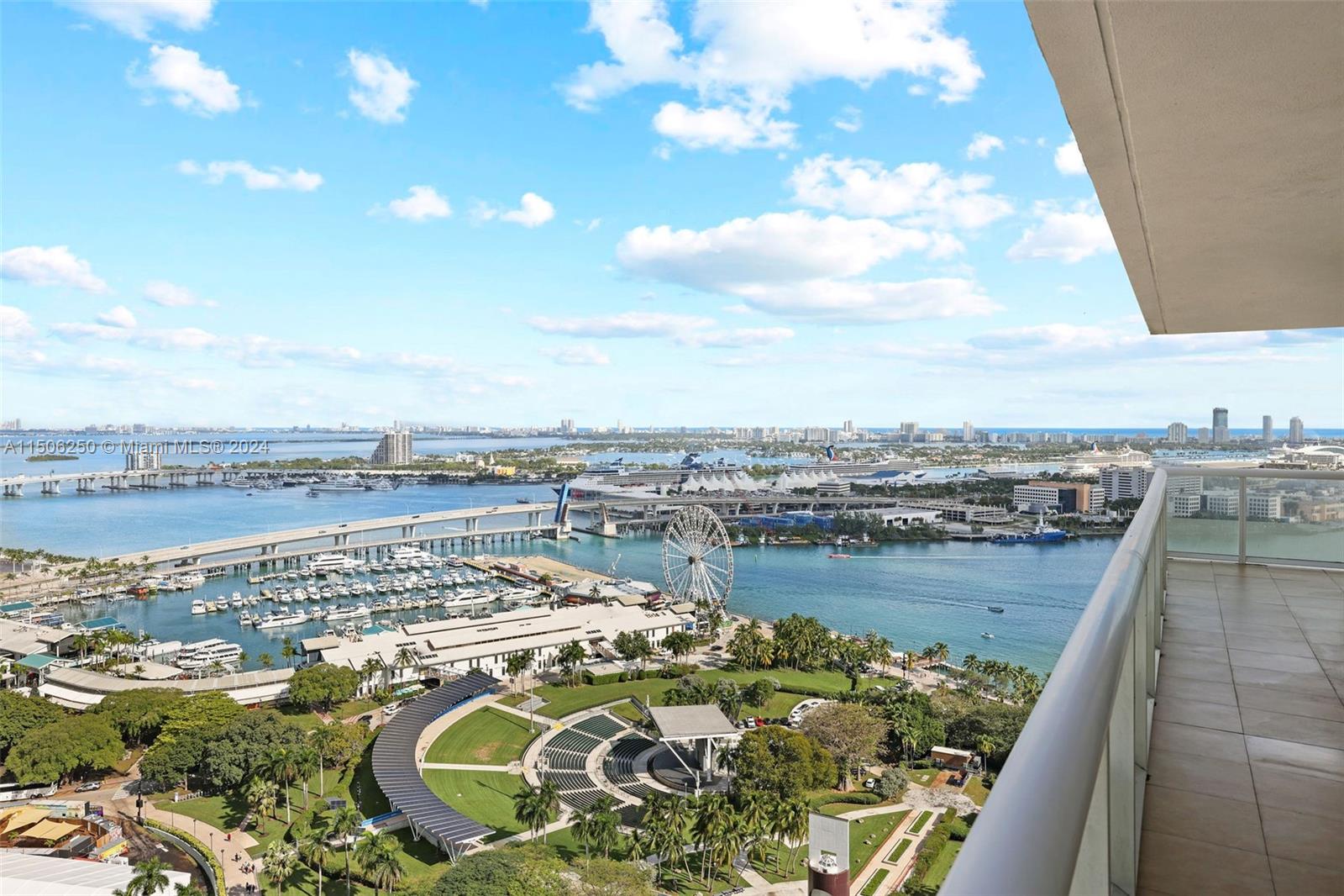 50 Biscayne Boulevard, Unit 3102 Miami, FL 33132 - Photo 28 of 43 a view of a lake with tall buildings